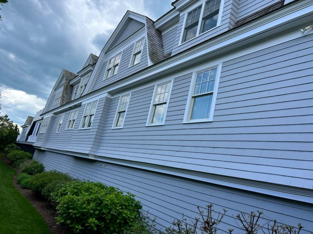 Long gray clapboard exterior