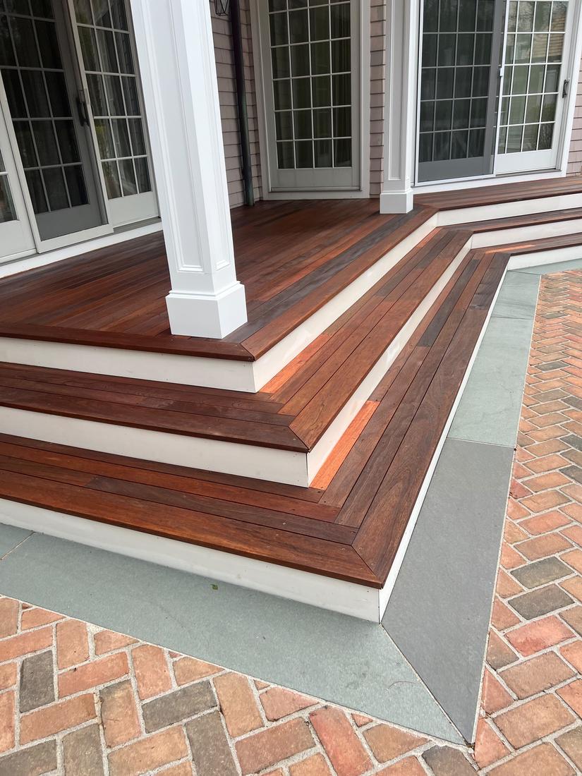 Stained deck steps with white risers