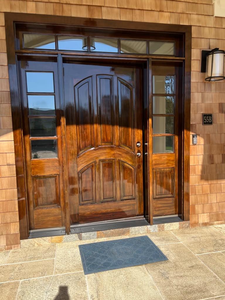 Varnished wood double doors