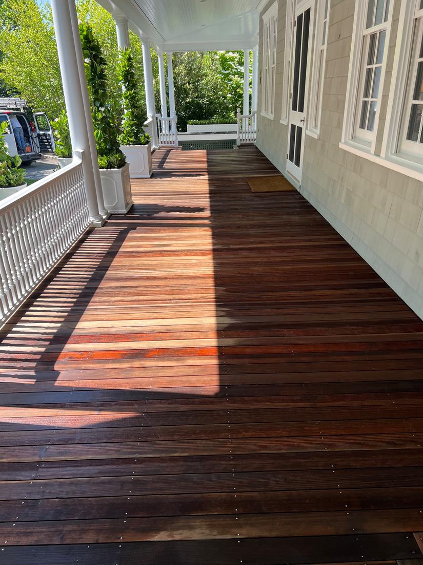 Freshly stained mahogany porch deck